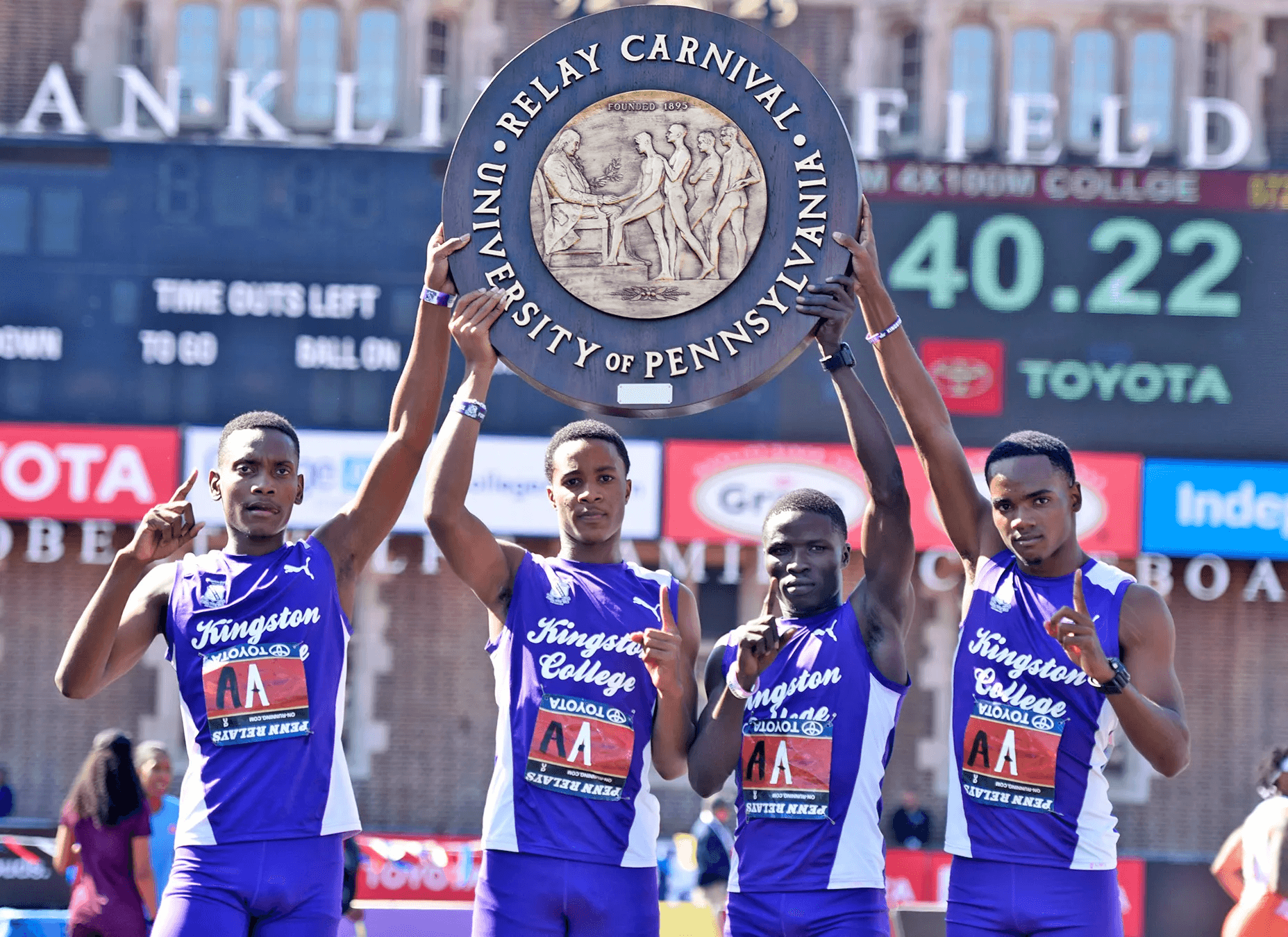 Jamaican athletes celebrating at Penn Relays